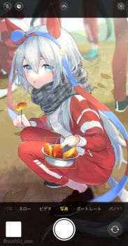 Rule 34 | 1girl, absurdres, animal ears, apple, apple slice, black shoes, blue eyes, blue hairband, blurry, blurry background, commentary request, depth of field, ear covers, fake phone screenshot, fake screenshot, food, from side, fruit, full body, grass, grey hair, hair between eyes, hairband, headband, highres, holding, holding food, holding fruit, holding pan, horse ears, horse girl, horse tail, jacket, kadokura (sushiu max), leaf, long hair, long sleeves, looking at viewer, looking to the side, multicolored jacket, on grass, open mouth, outdoors, pants, pants rolled up, plaid clothes, plaid scarf, red hairband, red jacket, red pants, red track suit, scarf, shoes, sneakers, squatting, striped clothes, striped hairband, tail, tamamo cross (umamusume), toothpick, tracen training uniform, track pants, track suit, translation request, twitter username, two-tone jacket, umamusume, very long hair, white jacket