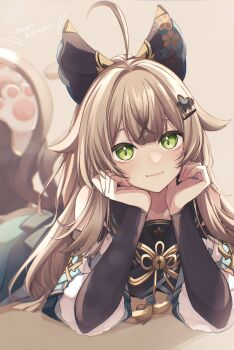 1girl absurdres ahoge animal_ears animal_feet bell black_sleeves brown_background brown_hair cat_ears cat_girl cat_tail closed_mouth commentary_request detached_sleeves elbow_rest genshin_impact green_eyes hair_ornament hairclip happy_birthday highres jingle_bell kirara_(genshin_impact) light_blush long_hair long_sleeves looking_at_viewer lying multiple_tails on_stomach smile solo tail two_tails yanagida_shiina