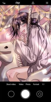 1girl blush busuttt camera_phone carousel chainsaw_man green_eyes hair_between_eyes hair_bun highres long_shirt looking_at_viewer medium_hair open_mouth pink_shirt purple_hair reze_(chainsaw_man) shirt smile solo updo viewfinder