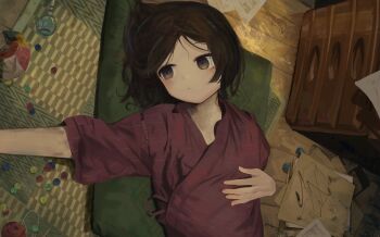 1girl absurdres black_hair brown_eyes cushion drawing_(object) eliot_(eokaitekaite969) floor hand_on_own_stomach highres japanese_clothes lying marble_(toy) on_back on_cushion original paper pencil pencil_sharpener short_sleeves tansu_(cabinet) upper_body wooden_floor
