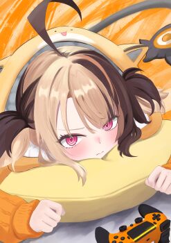 1girl absurdres ahoge animal_hood bluetopaz1049 blush brown_hair cat_hood closed_mouth commentary_request controller earrings game_controller gigi_murin grem_(gigi_murin) hair_between_eyes highres hololive hololive_english hood hood_up hoodie huge_ahoge jewelry long_sleeves looking_at_viewer lying on_stomach orange_hoodie pillow pink_eyes short_twintails solo stud_earrings tail twintails virtual_youtuber