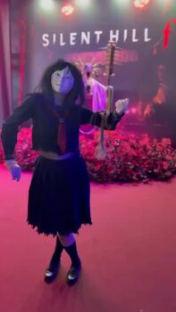 animated ayakakashi ayakakashi_(cosplay) bent_over black_eyes black_hair black_serafuku black_shirt black_skirt breasts cosplay expressionless hair_between_eyes highres japanese_(nationality) logo looking_at_another looking_at_viewer midriff navel neckerchief photo_(medium) photo_(object) priestess_sakuko real_life red_neckerchief rope rope_marks school_uniform serafuku shaded_face shirt short_hair silent_hill_(series) silent_hill_f skirt smile sound tagme torn_clothes torn_shirt torn_skirt underboob video walking