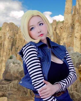 1girl android_18 android_18_(cosplay) blonde_hair blue_eyes breasts cosplay dragonball_z female_focus highres large_breasts lipstick looking_at_viewer makeup medium_hair model shibuya_kaho solo wig