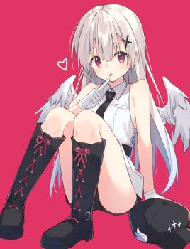 1girl angel bare_shoulders black_boots black_hat black_necktie boots closed_mouth double-parted_bangs gloves hair_between_eyes hat heart highres lace long_hair looking_at_viewer multicolored_eyes necktie no_headwear on_floor on_ground original pale_skin pink_background red_eyes shirt shoelaces simple_background sitting sleeveless solo tongue tongue_out white_gloves white_hair white_shirt white_wings wings zoirun