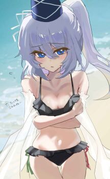 1girl absurdres arms_under_breasts beach bikini blue_eyes blue_hat blush breasts cleavage closed_mouth commentary_request crossed_arms flying_sweatdrops frilled_bikini frills grey_hair hair_between_eyes hat highres io16sii long_hair looking_at_viewer mononobe_no_futo navel outdoors ponytail solo swimsuit tate_eboshi touhou translation_request