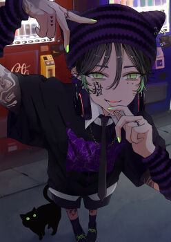 1boy absurdres animal_ear_headwear arm_tattoo arm_warmers black_cat black_hair black_hat black_shirt black_shoes black_shorts black_socks cat cat_day collared_shirt commentary ear_piercing english_commentary facial_tattoo fake_animal_ears finger_tattoo fingernails full_body green_eyes green_hair green_nails hat highres holding male_focus multicolored_hat nail_polish niwa281610 original piercing purple_hat safety_pin shirt shoes shorts socks solo striped_hat tattoo triangle vending_machine