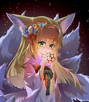 1girl absurdres animal_ears arknights ball blonde_hair chinese_commentary commentary_request fox_ears fox_girl fox_tail green_eyes hair_ornament hairband highres holding japanese_clothes kimono kitsune kyuubi long_hair multiple_tails official_alternate_costume pink_kimono red_hairband sen_zi_huo_xini solo suzuran_(arknights) suzuran_(yukibare)_(arknights) tail