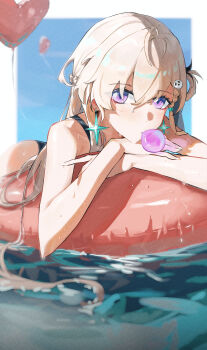 1girl absurdres balloon bare_shoulders blonde_hair blowing_bubble_gum blue_sky blurry blurry_background blush chewing_gum chinese_commentary commentary_request day earrings hair_between_eyes hair_ornament heart_balloon highres jewelry looking_at_viewer lynae_(wuthering_waves) outdoors purple_eyes skull_hair_ornament sky solo star_(symbol) star_earrings swim_ring tianqing_miaofa_hao water wet wuthering_waves