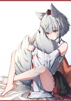 Rule 34 | 1girl, animal ears, bare shoulders, barefoot, bed sheet, black skirt, border, closed mouth, commentary request, crossed legs, detached sleeves, full body, grey hair, hair between eyes, hat, highres, hugging own tail, hugging tail, inubashiri momiji, leaf, long sleeves, maple leaf, mild pitch, on bed, red border, red eyes, red hat, ribbon-trimmed sleeves, ribbon trim, shirt, short hair, sitting, skirt, sleeveless, sleeveless shirt, solo, tail, tokin hat, touhou, white shirt, white sleeves, wide sleeves, wolf ears, wolf girl, wolf tail
