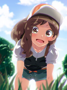 1girl :d all_fours baseball_cap black_shirt blue_shorts blue_sky blush breasts brown_eyes brown_hair cloud cloudy_sky collarbone commentary_request day elaine_(pokemon) from_below full_body grass hat highres komochizuki_rakuraku long_hair looking_at_viewer looking_down nintendo on_ground open_mouth outdoors pokemon pokemon_lgpe red_hat shirt short_shorts short_sleeves shorts sky small_breasts smile solo tongue tree two-tone_shirt wavy_hair white_hat white_shirt