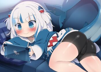 1girl animal_hood ass bike_shorts blue_eyes blue_hair blue_hoodie blue_nails blush closed_mouth couch dagasi fins fish_tail gawr_gura gawr_gura_(1st_costume) highres hololive hololive_english hood hoodie loli long_sleeves lying multicolored_hair nintendo_switch on_couch on_side playing_games shark_girl shark_hood shark_tail short_twintails smile solo streaked_hair tail twintails virtual_youtuber white_hair