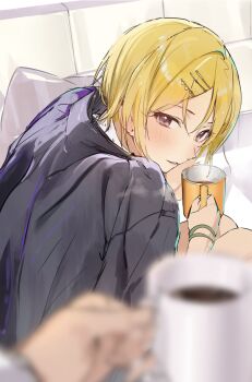 1girl black_jacket blonde_hair blurry blurry_foreground blush coffee_mug commentary_request cup hair_ornament hairpin highres holding holding_cup idolmaster idolmaster_shiny_colors jacket looking_at_viewer mug parted_lips pov purple_eyes saijo_juri short_hair uouokuma wristband