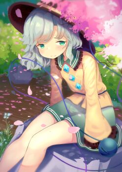 1girl black_hat blush buttons cherry_blossoms closed_mouth collared_shirt commentary_request diamond_button eyeball falling_petals frilled_shirt_collar frilled_sleeves frills green_eyes green_hair green_skirt hat highres komeiji_koishi long_sleeves looking_at_viewer outdoors petals pink_petals shirt sitting skirt solo third_eye toroid_(621997) touhou yellow_shirt