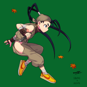 antenna_hair autumn_leaves bandaged_arm bandages bandana black_hair bow clothing_cutout fingerless_gloves gloves green_background hip_vent holding holding_weapon ibuki_(street_fighter) kunai leaf mugu nike_(company) ninja ponytail shoes sparkle street_fighter street_fighter_iii_(series) tiptoes torn_clothes torn_sleeves waist_bow weapon