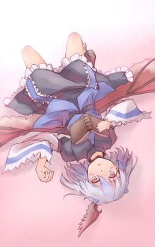 1girl black_skirt blue_hair blue_shirt book commentary_request full_body head_wings holding holding_book knees_up light_blush long_sleeves looking_at_viewer lying on_back one-hour_drawing_challenge orange_eyes parted_lips pink_background rangycrow red_wings shirt single_head_wing skirt small_horns solo tokiko_(touhou) touhou wings