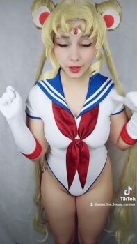 Rule 34 | 1girl, animated, animated gif, ass, bishoujo senshi sailor moon, blonde hair, breasts, cosplay, from behind, gloves, large breasts, leotard, long hair, photo (medium), real life, sailor moon, sailor moon (cosplay), short sleeves, thong leotard, tsukino usagi, very long hair, yuno the loose