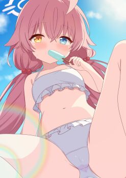 1girl ahoge arm_at_side bikini blue_archive blue_eyes blue_sky blush breasts cameltoe commentary crossed_bangs day feet_out_of_frame food food_in_mouth foreshortening frilled_bikini frills from_below hair_between_eyes hair_bobbles hair_ornament halo halterneck hand_up heterochromia highres hiiragisensei holding holding_food holding_popsicle hoshino_(blue_archive) hoshino_(swimsuit)_(blue_archive) lens_flare long_hair looking_at_viewer low_twintails official_alternate_costume official_alternate_hairstyle outdoors partially_visible_vulva pink_hair pink_halo popsicle popsicle_in_mouth sitting sky small_breasts solo spread_legs sweat swimsuit thighs twintails very_long_hair white_bikini yellow_eyes