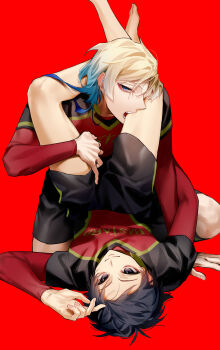 2boys absurdres arm_support biting black_hair blonde_hair blue_eyes blue_hair blue_lock full_body gradient_hair hair_between_eyes highres holding_another&#039;s_leg ichimonjikun2 isagi_yoichi kneeling legs_up looking_at_viewer lying male_focus michael_kaiser multicolored_hair multiple_boys on_back open_mouth profile red_background short_hair shorts smile soccer_uniform sportswear teeth yaoi