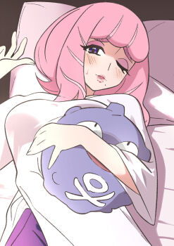 1girl alternate_costume blue_eyes blush breasts character_doll commentary_request doll eyelashes eyeshadow head_on_pillow highres holding klara_(pokemon) long_hair looking_at_viewer lying makeup mole mole_under_mouth nintendo ocha_keroberosu on_back one_eye_closed open_mouth pillow pink_eyeshadow pink_hair pokemon pokemon_sword_and_shield shirt sweatdrop three-quarter_sleeves upper_body white_shirt