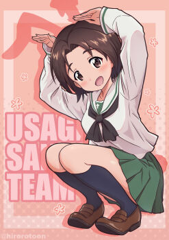 1girl arms_up black_neckerchief black_socks blouse blush brown_eyes brown_hair brown_shoes commentary ehirorotoon english_text full_body girls_und_panzer green_skirt highres loafers long_sleeves looking_at_viewer miniskirt neckerchief ooarai_school_uniform open_mouth parted_bangs pink_background pleated_skirt rabbit_pose sailor_collar sawa_azusa school_uniform serafuku shadow shirt shoes short_hair skirt smile socks solo squatting text_background twitter_username white_sailor_collar white_shirt