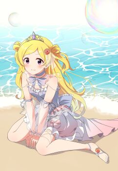1girl absurdres barefoot beach blonde_hair blush commentary_request crown dress emily_stewart highres idolmaster idolmaster_million_live! long_hair long_sleeves ocean outdoors purple_eyes sand sitting smile solo water yukipo_p