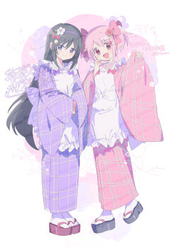 2girls :d akemi_homura apron black_hair black_sandals blush bow brown_sandals closed_mouth flower full_body hair_bow hair_flower hair_ornament hairband hand_up highres japanese_clothes kaname_madoka kimono long_hair long_sleeves looking_at_viewer mahou_shoujo_madoka_magica multiple_girls okobo open_mouth pink_bow pink_eyes pink_hair pink_kimono platform_sandals purple_eyes purple_hairband purple_kimono sandals serizawa_serizane short_hair short_twintails smile standing tabi twintails white_apron wide_sleeves