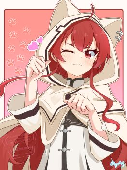 1girl absurdres ahoge altair_altea animal_hood blush border cloak closed_mouth commentary_request eris_greyrat gradient_background hands_up heart highres hood hooded_cloak long_hair mushoku_tensei one_eye_closed outline outside_border paw_pose paw_print paw_print_background pink_background red_eyes red_hair shirt signature solo upper_body very_long_hair watermark white_border white_cloak white_outline white_shirt
