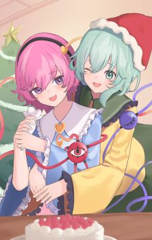 2girls alternate_headwear black_hairband blue_shirt blush buttons cake christmas christmas_cake christmas_tree collared_shirt commentary_request eyeball food frilled_shirt_collar frilled_sleeves frills fur-trimmed_headwear fur_trim green_eyes green_hair green_skirt hair_ornament hairband hat heart heart_button heart_hair_ornament highres holding holding_pastry_bag hug hug_from_behind komeiji_koishi komeiji_satori long_sleeves multiple_girls one_eye_closed open_mouth pastry_bag pink_hair pink_skirt purple_eyes red_hat ribbon-trimmed_collar ribbon_trim santa_hat shirt siblings sisters skirt smile tentyuu_th third_eye touhou wide_sleeves yellow_shirt