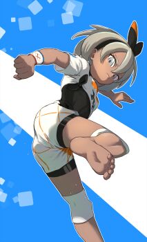 1girl absurdres barefoot bea_(pokemon) black_bodysuit black_hairband blonde_hair bodysuit bodysuit_under_clothes bow_hairband clenched_hand closed_mouth commentary dynamax_band eyelashes feet foot_out_of_frame grey_eyes hair_between_eyes hairband highres iroiro_yaru_hito knee_pads leg_up looking_at_viewer nintendo pokemon pokemon_swsh print_shirt shirt short_hair short_sleeves shorts soles solo tied_shirt toes white_shirt white_shorts