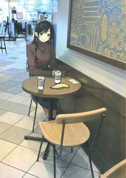1girl banana black_hair brown_eyes brown_sweater chair cup day disposable_cup earrings food fruit highres indoors jewelry long_sleeves looking_at_viewer miyajima_reiji necklace photo_background ribbed_sweater sitting solo sweater table