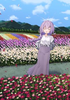 1girl :d ^_^ absurdres alternate_costume alternate_hairstyle arms_behind_back atsuko_(blue_archive) blue_archive blue_sky braid braided_ponytail closed_eyes cloud commentary coralreef966 cosmos_(flower) daisy_(flower) day facing_viewer falling_petals field flower flower_field hair_over_shoulder halo highres lavender_(flower) long_hair long_skirt mountain mountainous_horizon open_mouth outdoors path petals purple_hair purple_halo purple_skirt road scenery shirt single_braid skirt sky smile solo standing tree white_shirt