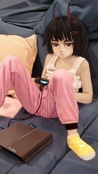 1girl black_hair brown_eyes closed_mouth controller couch game_console game_controller hair_ornament hairclip highres holding holding_controller horns katya_(servachok) looking_at_viewer original pants pillow pink_pants playstation_4 polka_dot polka_dot_socks servachok short_hair sitting socks solo tank_top white_tank_top