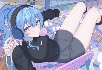 1girl absurdres bag black_sweater blue_eyes blue_hair boots breasts chewing_gum commentary_request grey_skirt headphones high_ponytail highres holding holding_bag hololive hoshimachi_suisei in_shopping_cart looking_at_viewer miniskirt nolc orange_nails ponytail shopping_bag shopping_cart skirt solo star_(symbol) star_in_eye stuffed_animal stuffed_toy sweater symbol_in_eye teddy_bear thighs virtual_youtuber