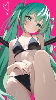 1girl absurdres arm_at_side bare_arms bare_shoulders bikini black_bikini blush breasts closed_mouth coco_irasuto collarbone commentary_request crossed_bangs expressionless feet_out_of_frame gradient_hair hair_between_eyes hair_ornament hand_on_own_stomach hatsune_miku head_tilt heart highres knee_up long_hair looking_at_viewer multicolored_hair navel pink_background simple_background skindentation small_breasts solo swimsuit twintails very_long_hair vocaloid