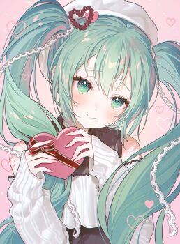 1girl blush box closed_mouth detached_sleeves floating_hair fymrie green_eyes green_hair hair_ornament hat hatsune_miku head_tilt heart heart-shaped_box heart_hair_ornament highres holding holding_box long_hair long_sleeves looking_at_viewer pink_background shirt sleeves_past_wrists smile solo twintails upper_body valentine very_long_hair vocaloid white_hat white_shirt