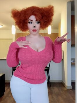 1girl afro rouge_(makeup) breasts brown_eyes chair cleavage collarbone cosplay cosplay_photo couch disney extended_hand eyelashes eyeliner female_focus goof_troop hand_on_own_chest highres kitchen lamp large_breasts light lips lipstick makeup medium_hair mickey_mouse_&amp;_friends nail_polish paint_splatter paint_splatter_on_face pants peg_pete peg_pete_(cosplay) photo_(medium) pink_lips pink_nails pink_sweater png_conversion red_hair solo source_request sweater tagme thejulietttemichele thick_thighs thighs white_pants white_wall wide_hips wig wooden_floor