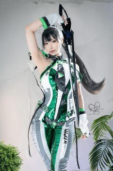 1girl absurdres ass black_hair cosplay cosplay_photo eve_(stellar_blade) eve_(stellar_blade)_(cosplay) female_focus hane_ame highres long_hair photo_(medium) planet_diving_suit_(7th)_(stellar_blade) ponytail real_life solo stellar_blade