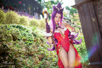 1girl angela_(seiken_densetsu_3) angela_(seiken_densetsu_3)_(cosplay) artist_name breasts cleavage cosplay cosplay_photo fake_ears female_focus gloves hair_intakes hane_ame highres large_breasts leotard long_hair patreon_username photo_(medium) pointy_ears purple_gloves real_life red_leotard seiken_densetsu seiken_densetsu_3 showgirl_skirt sidelocks solo square_enix swept_bangs thighs watermark web_address