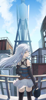 absurdres black_sleeves blue_sky closed_mouth cloud commentary_request detached_sleeves eiyuu_densetsu fie_claussell from_behind green_eyes grey_hair hat highres holding holding_unworn_clothes holding_unworn_hat in-universe_location kuro_no_kiseki_(series) kuro_no_kiseki_i long_hair looking_at_viewer looking_back sky smile tower unworn_hat unworn_headwear witch_f