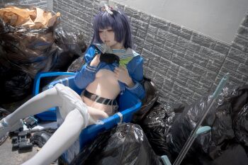 1girl animal_ears belt blue_archive breasts closed_eyes condom condom_belt condom_in_mouth condom_on_head cosplay etsuko827 fake_animal_ears headband lifting_own_clothes miyu_(blue_archive) mouth_hold pantyhose photo_(medium) rabbit_ears real_life school_uniform shoes tagme trash trash_bag trash_can underboob white_pantyhose white_shoes