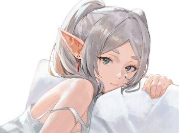 1girl commentary earrings elf english_commentary floating_earrings frieren green_eyes grey_hair highres j@ck jewelry long_hair looking_at_viewer pillow pointy_ears sleepwear solo sousou_no_frieren strap_slip twintails