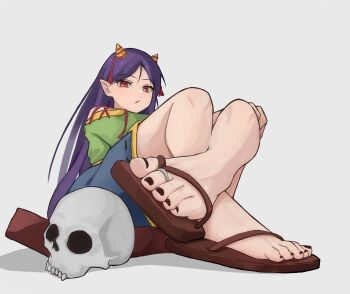 1girl black_hair blue_shorts brown_nails commentary_request cone_horns feet flip-flops foot_focus green_shirt highres horn_ornament horns jager jewelry long_hair nippaku_zanmu pointy_ears red_eyes sandals shirt shorts simple_background sitting skull small_horns solo toe_ring toenails touhou very_long_hair white_background yellow_horns