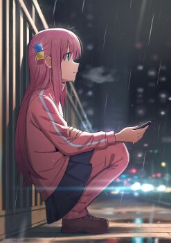 1girl absurdres against_railing black_skirt blue_eyes blurry blurry_background bocchi_the_rock! brown_shoes cellphone commentary_request full_body gotoh_hitori hair_ornament hanagami_gendai highres holding holding_phone jacket lens_flare long_hair night outdoors pants parted_lips phone pink_hair pink_jacket pink_pants pleated_skirt railing rain shoes skirt smartphone solo squatting track_jacket track_pants track_suit