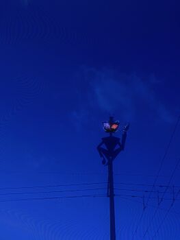 1boy blue_sky colored_sclera commentary_request glowing glowing_eyes hand_up hat hazbin_hotel hellaverse heterochromia highres mebi_(mb_hzbn) outdoors red_sclera sitting sky solo television top_hat vox_(hazbin_hotel)