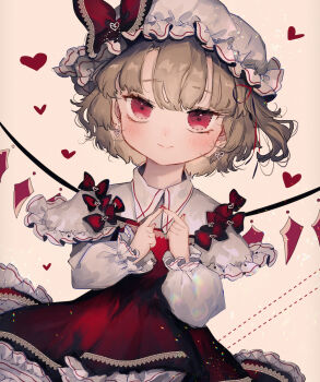 1girl blonde_hair blush bow capelet closed_mouth collared_shirt cowboy_shot crystal_wings dress earrings flandre_scarlet frilled_capelet frills grey_background hat hat_bow heart heart_earrings highres jewelry lace-trimmed_bow lace_trim light_particles long_sleeves looking_at_viewer majamari nail_polish puffy_long_sleeves puffy_sleeves red_bow red_dress red_eyes red_nails shirt short_hair simple_background smile solo standing too_many_bows touhou twiddling_fingers white_capelet white_hat wings