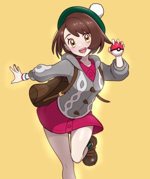 1girl :d absurdres backpack bag boots brown_bag brown_boots brown_eyes brown_hair buttons cardigan collared_dress dress dynamax_band gloria_(pokemon) green_hat grey_cardigan hand_up happy hat highres holding holding_poke_ball hood hood_down hooded_cardigan leg_up looking_at_viewer muis0802 nintendo open_mouth pink_dress poke_ball poke_ball_(basic) pokemon pokemon_swsh short_hair smile socks solo tam_o&#039;_shanter teeth tongue upper_teeth_only yellow_background
