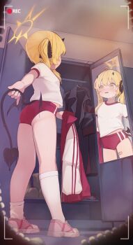 1girl absurdres ass bandaid bandaid_on_thigh blonde_hair blue_archive blush buruma commentary demon_horns demon_tail full_body gym_uniform halo highres holding holding_jacket holding_own_tail holding_unworn_clothes horns ibuki_(blue_archive) indoors jacket legs locker locker_room loli long_hair mirror open_mouth pink_shoes recording red_buruma reflection shirt shoes short_sleeves single_loose_sock socks solo standing stpen tail thighs track_jacket twintails unworn_jacket viewfinder voyeur_pov voyeurism white_shirt white_socks yellow_eyes yellow_halo