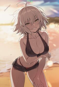 1girl ahoge arm_under_breasts artist_name beach bikini black_bikini breasts commentary english_commentary fate/grand_order fate_(series) grin hair_between_eyes highres jeanne_d'arc_alter_(fate) konekogou large_breasts looking_at_viewer mismatched_bikini red_bikini short_hair short_shorts shorts smile solo swimsuit twitter_username wet white_hair yellow_eyes