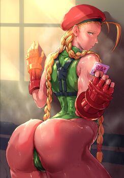 1girl ass beret blonde_hair braid butt_crack cammy_white condom condom_wrapper embarrassed hat hentaix highres indoors leotard light_smile looking_at_viewer military_uniform nervous nervous_sweating presenting shy smile solo solo_focus steam steaming_body street_fighter sweat sweatdrop twin_braids