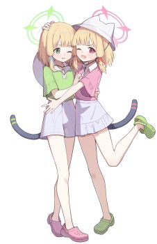 2girls ;d alternate_costume animal_ear_headwear black_tail blonde_hair blue_archive blue_ribbon blush cat_tail collared_shirt commentary_request crocs fake_animal_ears fake_tail full_body green_eyes green_halo green_shirt green_shoes hair_ribbon halo hand_on_another's_chest hand_on_another's_head hat headwear_request highres hug looking_at_viewer low-tied_sidelocks medium_hair midori_(blue_archive) momoi_(blue_archive) multiple_girls one_eye_closed open_mouth pink_eyes pink_halo pink_shirt pink_shoes red_ribbon ribbon shirt shoes short_sleeves shorts siblings sidelocks simple_background sisters skirt smile standing standing_on_one_leg tail teeth toki_kimagure twins unworn_hat unworn_headwear upper_teeth_only v-shaped_eyebrows white_background white_hat white_shorts white_skirt